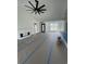 Bright living room with fireplace, fan and molding with views of the outdoors at 740 Jade Dr., Myrtle Beach, SC 29579