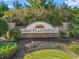 Elegant brick sign for Sago Plantation surrounded by manicured landscaping at 740 Jade Dr., Myrtle Beach, SC 29579