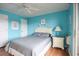 Cozy bedroom with hardwood floors, neutral decor, and ample natural light at 9501 Shore Dr. # A309, Myrtle Beach, SC 29572