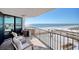 Oceanfront balcony with outdoor seating providing stunning ocean views at 9650 Shore Dr. # 503, Myrtle Beach, SC 29572