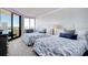 Comfortable guest bedroom with two beds, stylish coastal decor, and scenic views from the window at 9650 Shore Dr. # 503, Myrtle Beach, SC 29572