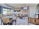 Bright dining area with comfortable seating, modern decor, and view of the open kitchen at 9650 Shore Dr. # 503, Myrtle Beach, SC 29572