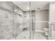 Tiled glass shower featuring a built-in seat and handheld shower wand at 9650 Shore Dr. # 503, Myrtle Beach, SC 29572