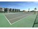 Tennis court with lush green surface for a friendly competition at 9650 Shore Dr. # 503, Myrtle Beach, SC 29572