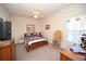 Cozy bedroom with a nautical themed bedspread, ceiling fan, and bright natural light at 1058 Sea Mountain Hwy. # 202, North Myrtle Beach, SC 29582