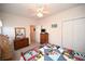 Bedroom showcasing a nautical themed bed with dresser, closet, and ceiling fan at 1058 Sea Mountain Hwy. # 202, North Myrtle Beach, SC 29582