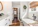 Bright bathroom featuring a tub, modern fixtures, and granite countertops at 11455 W Highway 19, Loris, SC 29569