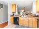 Kitchen area with stainless steel sink and view to living area at 1155 Harvester Circle # 1155, Myrtle Beach, SC 29579