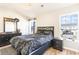 Bedroom featuring a large window and black furniture at 1155 Harvester Circle # 1155, Myrtle Beach, SC 29579