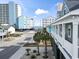 View of a coastal home's porch with white railings, close to the beach and local amenities at 119 Sunset Dr., Murrells Inlet, SC 29576