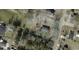 Aerial view of property with boundary lines on a large lot with mature trees in a quiet neighborhood at 12 E Sassafras St., Andrews, SC 29510