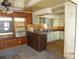 A kitchen featuring dated cabinetry and finishes at 12 E Sassafras St., Andrews, SC 29510