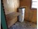 Interior room featuring a water heater and side counter at 12 E Sassafras St., Andrews, SC 29510