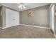 Neutral bedroom features a ceiling fan, carpet floors, and a closet at 128 Waterway Crossing Ct., Little River, SC 29566