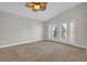 Bedroom with a ceiling fan and double doors that let in natural light for relaxing space at 128 Waterway Crossing Ct., Little River, SC 29566