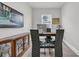 Cozy home office featuring built-in shelving and modern furniture with a bright window letting in lots of natural light at 1317 Captain Hooks Way, North Myrtle Beach, SC 29582