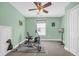 This room features an exercise bike, rowing machine, ceiling fan, and a television for your workout needs at 132 Summerlight Dr., Murrells Inlet, SC 29576