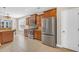 Well-equipped kitchen featuring stainless steel appliances and spacious tile flooring at 132 Summerlight Dr., Murrells Inlet, SC 29576