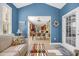 View of the living room with a view of the dining area and a decorated door at 132 Summerlight Dr., Murrells Inlet, SC 29576