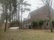 View of the backyard featuring a brick privacy fence, and outdoor utilities at 1413 Cane St. # 1, North Myrtle Beach, SC 29582