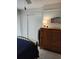 Bedroom featuring carpeted floors, wooden dresser and closet with white doors at 14A Salt Marsh Cove # 14A, Pawleys Island, SC 29585