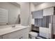 Clean bathroom featuring a single sink vanity, toilet, and shower with patterned curtain at 1527 Swing Bridge Way, Myrtle Beach, SC 29588