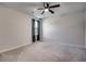 Spacious carpeted bedroom features a ceiling fan and a window providing natural light at 1527 Swing Bridge Way, Myrtle Beach, SC 29588