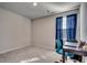 Bright bedroom with a window, plush carpet, and blue accents for a serene atmosphere at 1527 Swing Bridge Way, Myrtle Beach, SC 29588