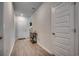 Bright entryway featuring wood-look flooring, white doors, and neutral wall paint at 1527 Swing Bridge Way, Myrtle Beach, SC 29588