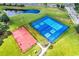 Community aerial view showing tennis and basketball courts and a small pond at 1616 Deltura Dr., Myrtle Beach, SC 29588