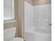 Clean, all-white bathroom with walk-in shower and toilet at 1616 Deltura Dr., Myrtle Beach, SC 29588