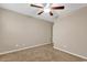 Neutral bedroom showcasing carpeted floors and a ceiling fan at 1616 Deltura Dr., Myrtle Beach, SC 29588