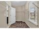 Walk-in closet with carpeted floors, shelving, and a window providing natural light at 1616 Deltura Dr., Myrtle Beach, SC 29588