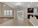 Bright dining area with a sliding glass door, hardwood floors, and views of the backyard at 1616 Deltura Dr., Myrtle Beach, SC 29588