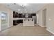 Open kitchen with stainless steel appliances, granite countertops, and a view of the backyard at 1616 Deltura Dr., Myrtle Beach, SC 29588