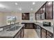 Well-equipped kitchen featuring granite countertops, a breakfast bar, and stainless steel appliances at 1616 Deltura Dr., Myrtle Beach, SC 29588