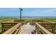 Elevated beach access boardwalk leads to the beach at 1709 S Ocean Blvd. # 510, North Myrtle Beach, SC 29582