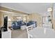 Spacious living room featuring comfortable seating, mirrored wall, and an open floor plan to the kitchen at 1709 S Ocean Blvd. # 510, North Myrtle Beach, SC 29582