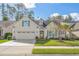 Charming single-story home with a well-manicured lawn, attached garage, and inviting curb appeal at 2122 Silver Spring Ln., Myrtle Beach, SC 29577