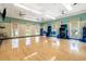 Bright fitness room with wood floors, mirrors, and exercise equipment for a complete workout at 2122 Silver Spring Ln., Myrtle Beach, SC 29577