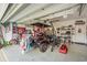 Well-organized garage with a golf cart and ample storage space at 2122 Silver Spring Ln., Myrtle Beach, SC 29577