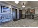 View of an elevator lobby, which features tile floors, overhead lighting, and an elegant waiting bench at 2307 S Ocean Blvd. # 5A, North Myrtle Beach, SC 29582