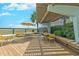 Outdoor deck features seating and tables for outdoor gatherings and relaxation at 2307 S Ocean Blvd. # 5A, North Myrtle Beach, SC 29582