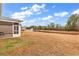 Spacious backyard with a pond, fountain, and lush greenery providing a picturesque outdoor setting at 235 Calhoun Falls Dr., Myrtle Beach, SC 29579