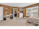 Warm bedroom with a TV, closet, carpet and a window providing natural light and neighborhood views at 235 Calhoun Falls Dr., Myrtle Beach, SC 29579