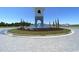 Aesthetic view of the community entrance with a fountain and manicured landscaping at 235 Calhoun Falls Dr., Myrtle Beach, SC 29579