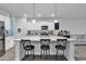 Spacious kitchen island with seating, modern lighting, and a clear view of the surrounding kitchen and living spaces at 235 Calhoun Falls Dr., Myrtle Beach, SC 29579