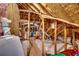 Unfinished attic space showing insulation, ductwork, and wooden structural elements at 2381 Tidewatch Way, North Myrtle Beach, SC 29582