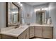 Bathroom with double vanity sinks, attractive mirrors, and stylish fixtures at 2381 Tidewatch Way, North Myrtle Beach, SC 29582