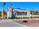 Welcome to Barefoot Resort & Golf, a community sign featuring lush landscaping at 2381 Tidewatch Way, North Myrtle Beach, SC 29582